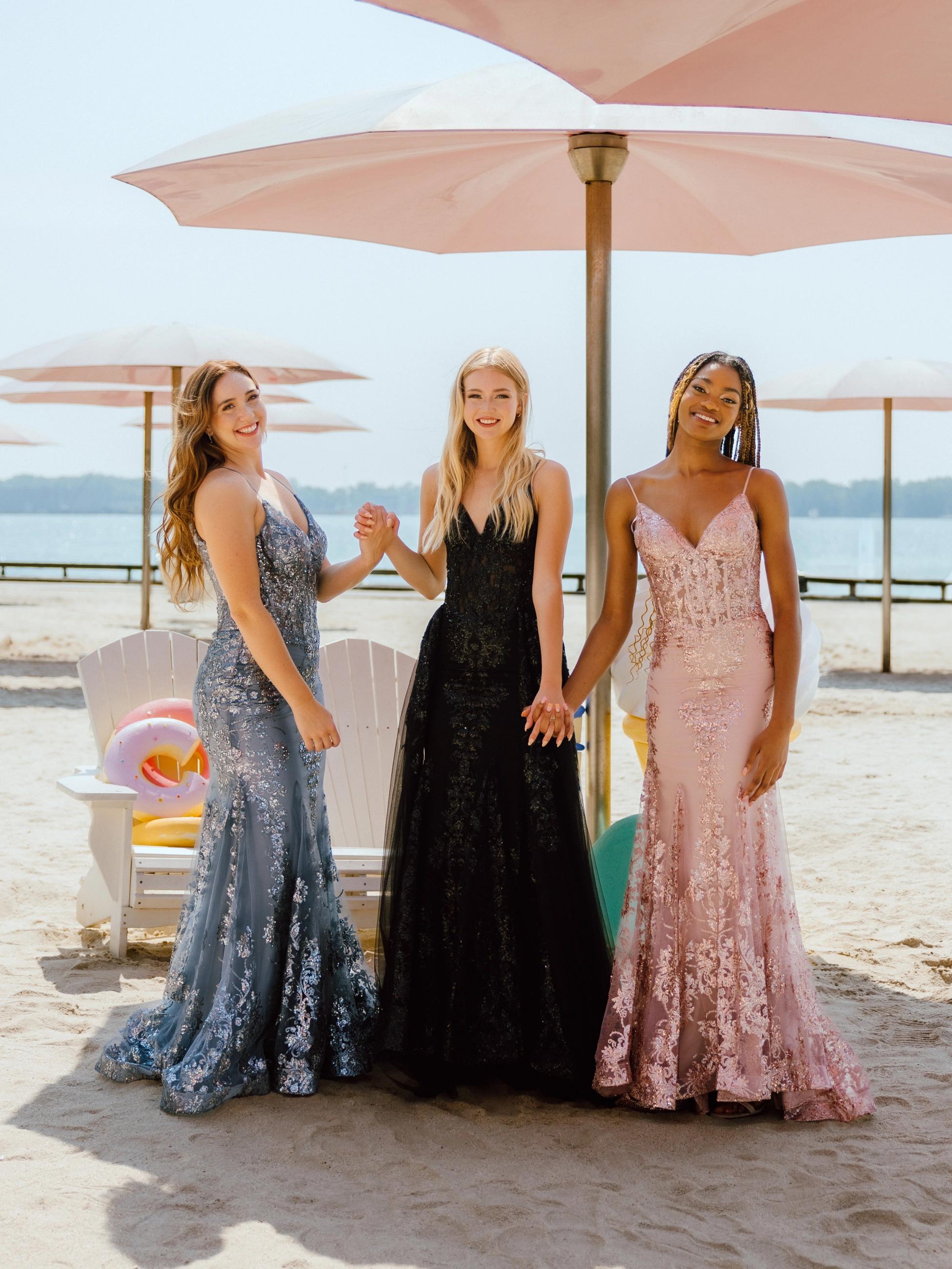 Models wearing a dressess by Candy Prom