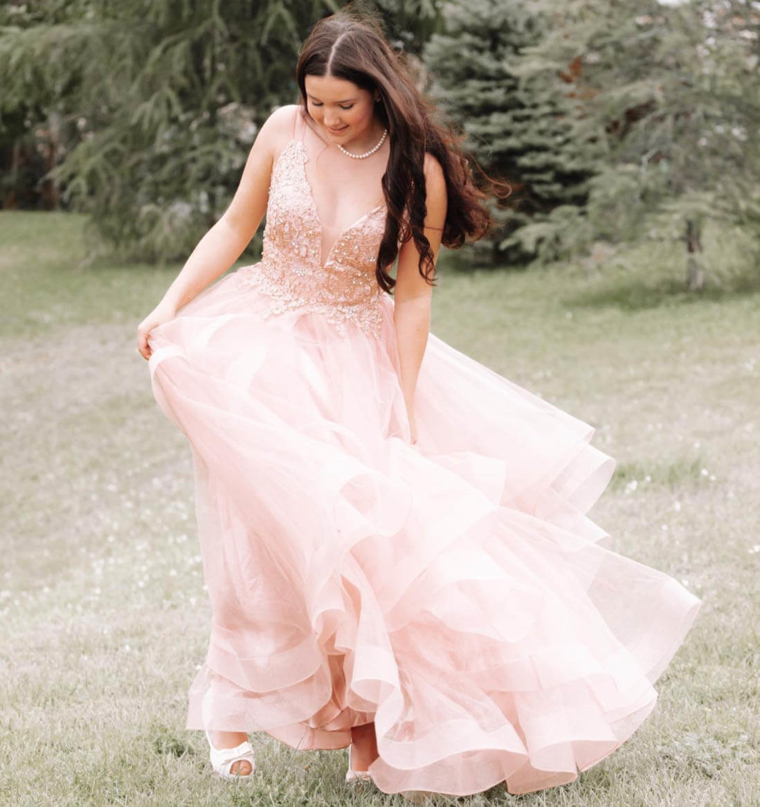 Model wearing a pink gown